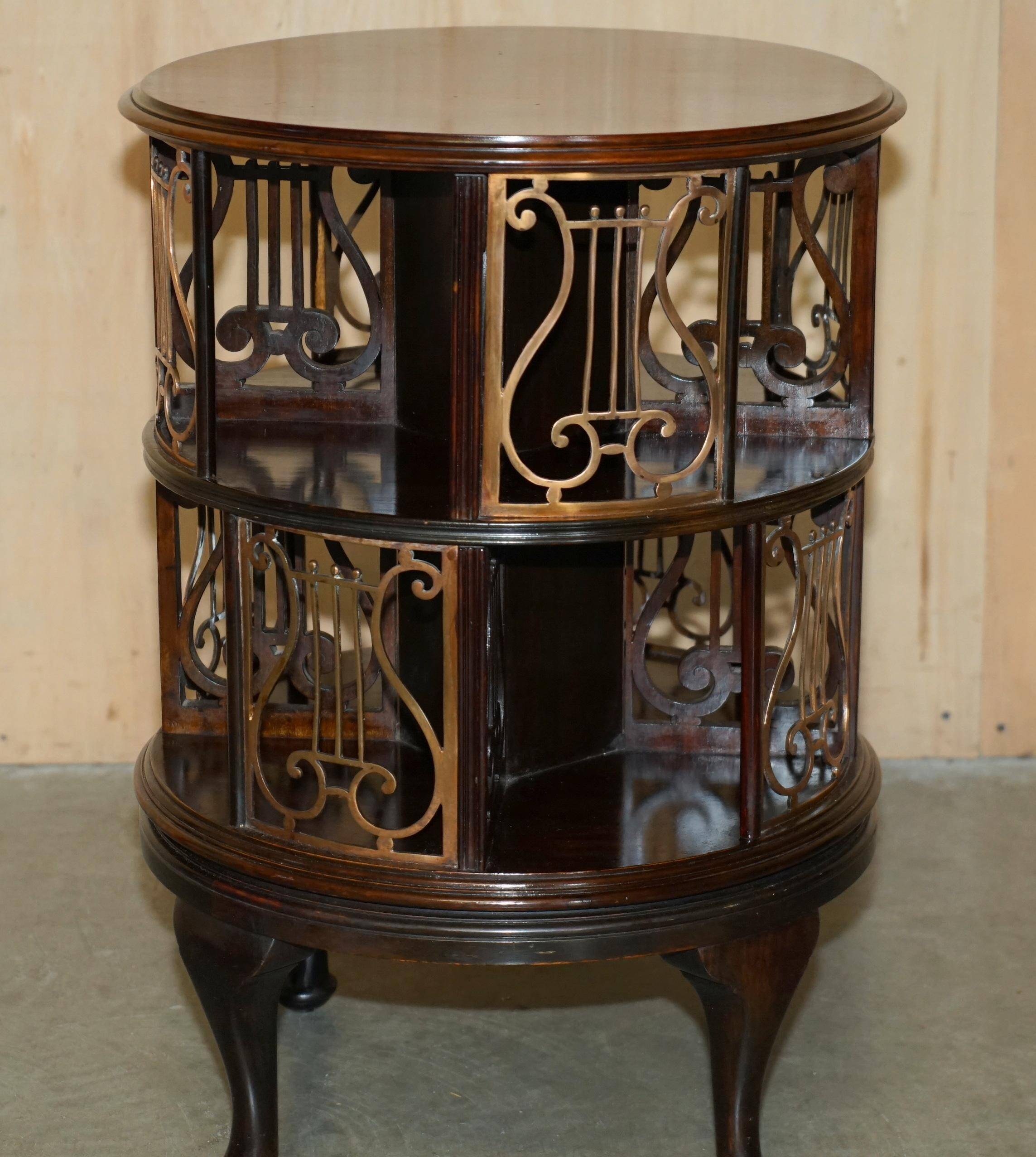 Restored Victorian library table in hardwood and brass.