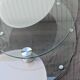 Coffee table with rotating glass tops by Antoine Motard.