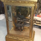 Cage pendulum with its double mercury bulb pendulum.