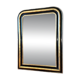 Louis-Philippe mirror in black and silver, 19th century.