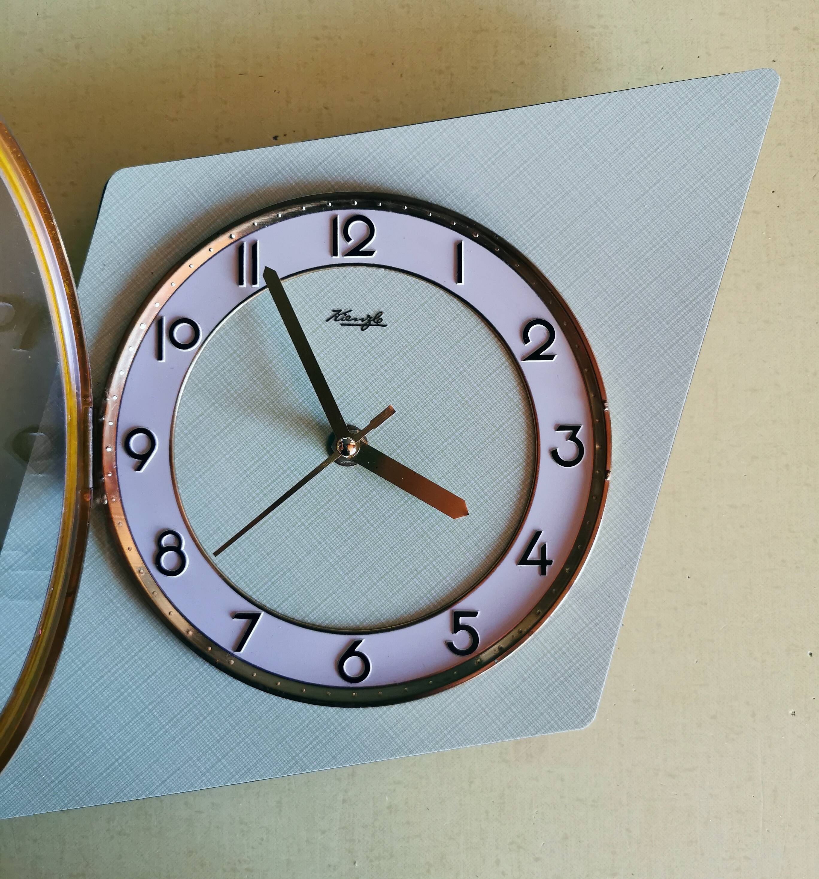 Vintage formica clock silent asymmetrical wall pendulum "Kienzle green"