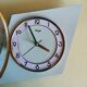 Vintage formica clock silent asymmetrical wall pendulum "Kienzle green"