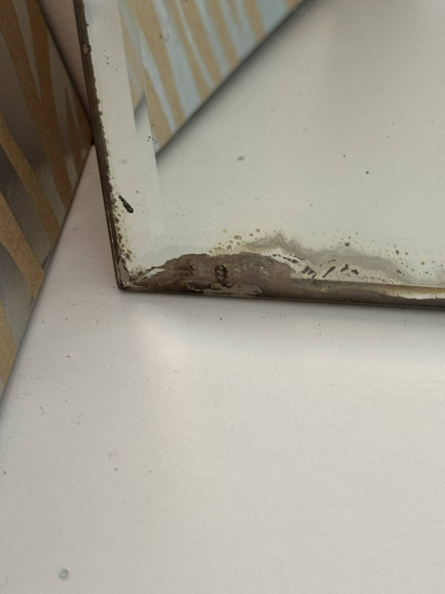 Vintage beveled mirror