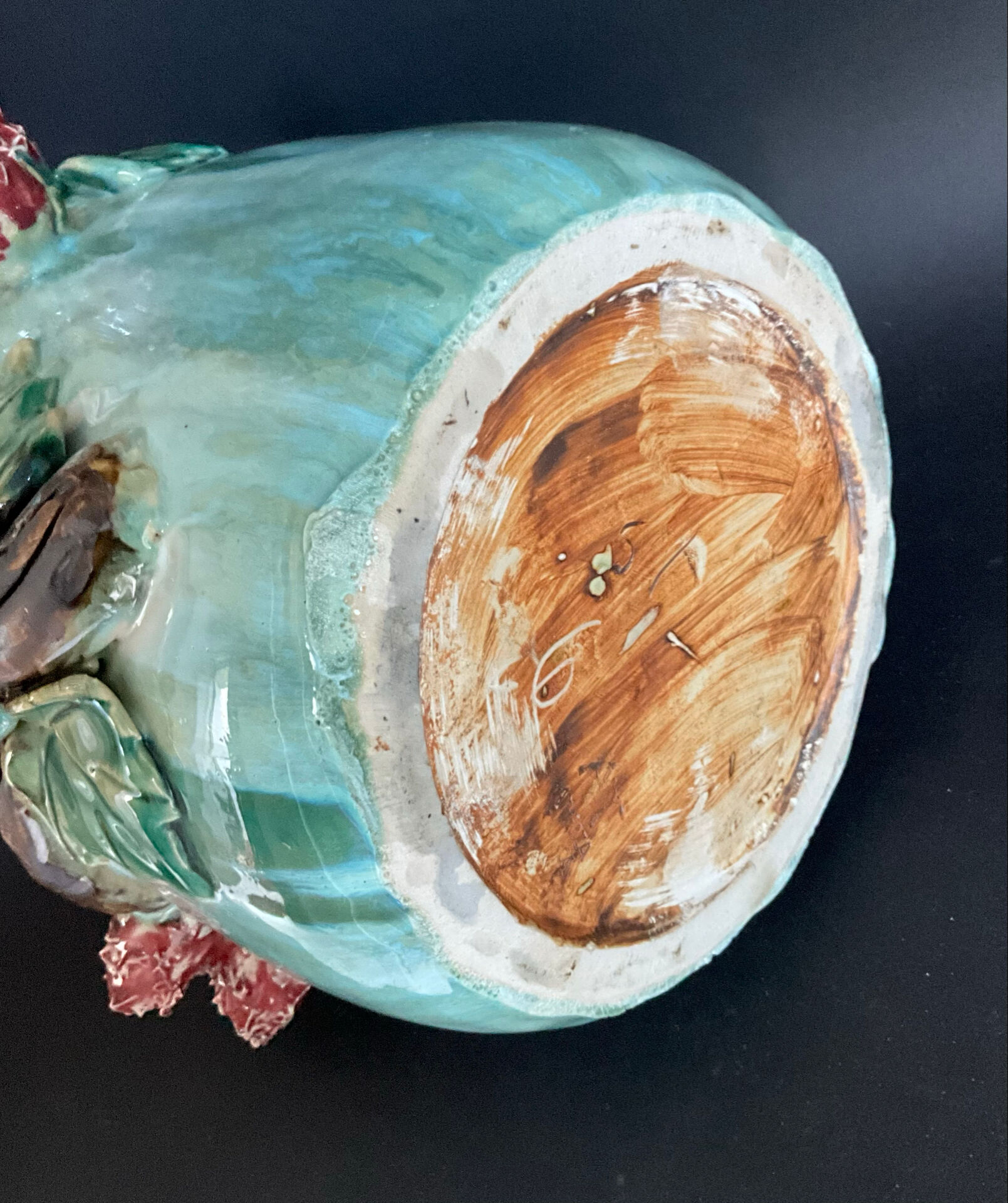 Large turquoise ceramic vase Athezza with raised floral decoration.