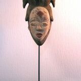 Punu mask on a base