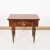 Vintage bedside table from the 70s in varnished wood.