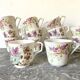 Antique flowered porcelain cups mismatched
