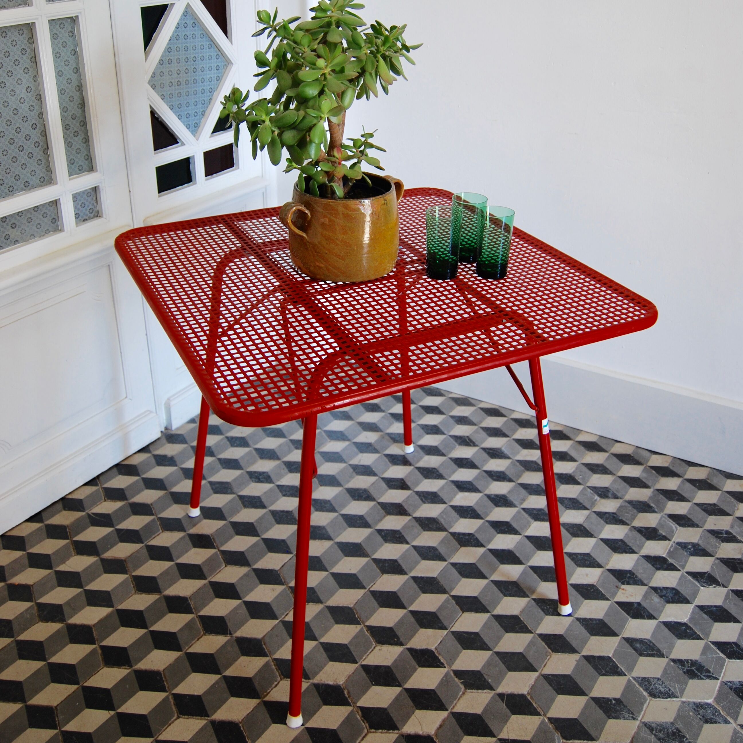 Red metal folding table Malaval type