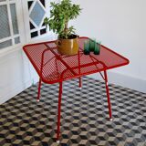 Red metal folding table Malaval type