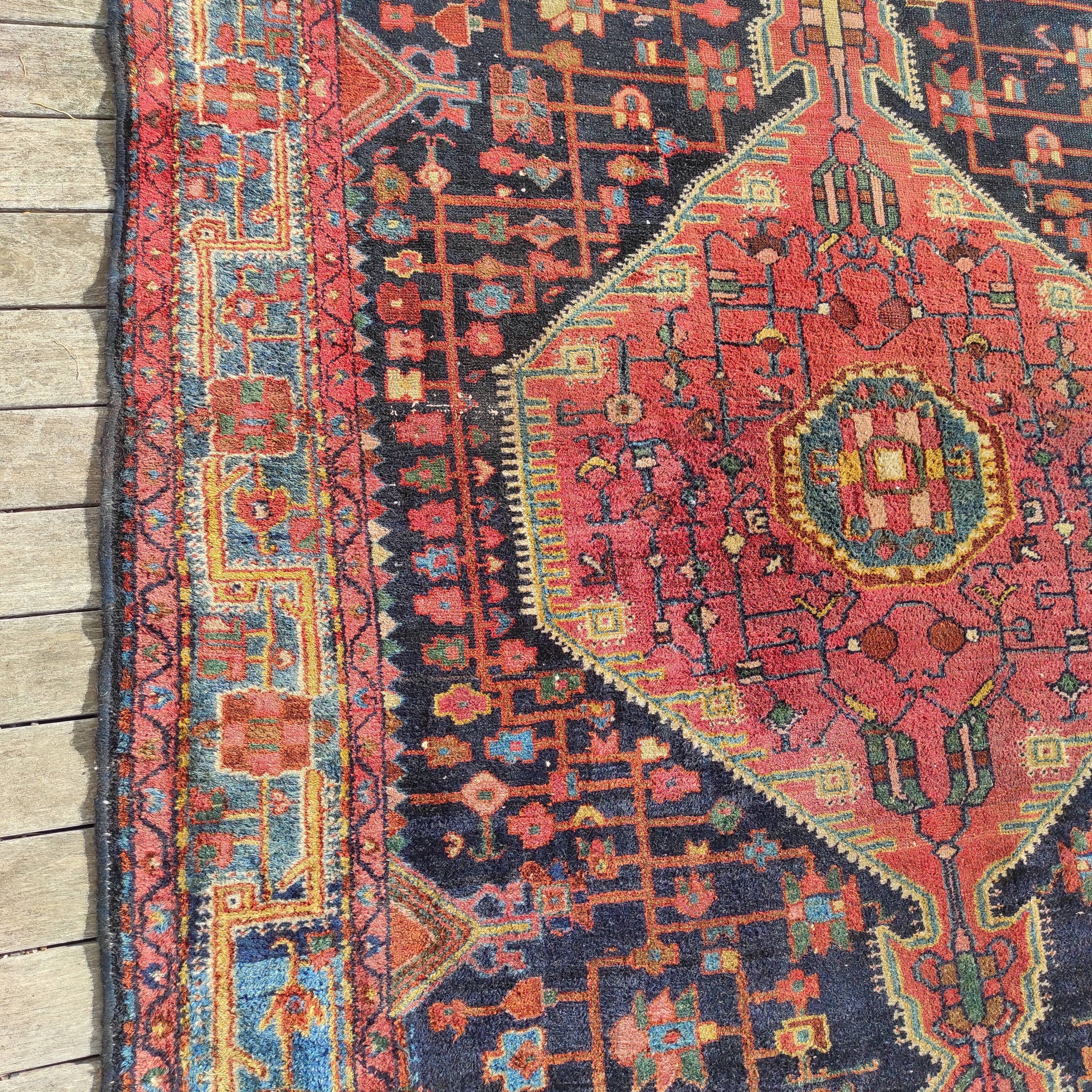 Old Persian carpet 1.62 m wide and 2.33 meters long