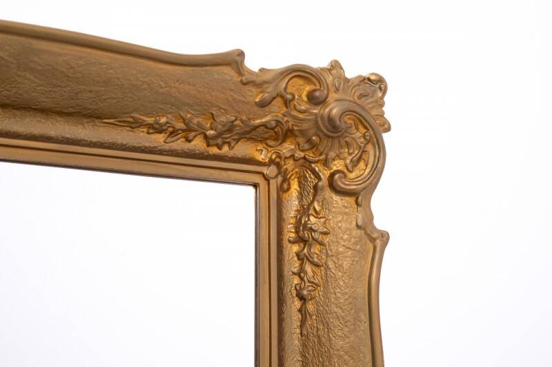 Large French mirror in a gold frame.