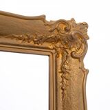 Large French mirror in a gold frame.