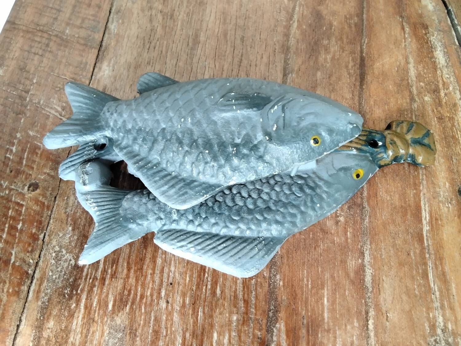 Heurtoir en fonte trio de poissons