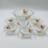Vintage glass fruit salad serving set with a pansy design.