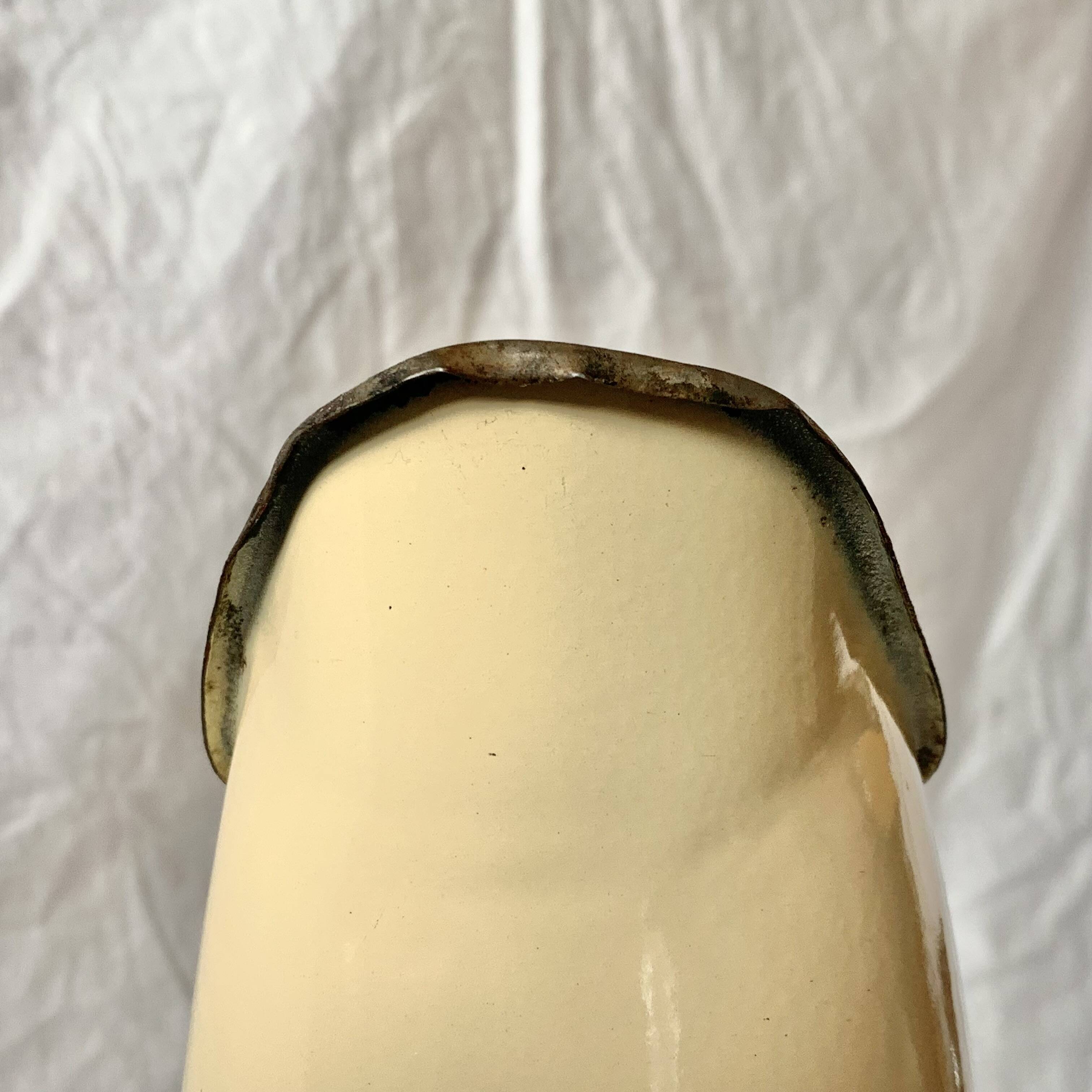 Vintage pitcher or jug in beige enamelled sheet metal