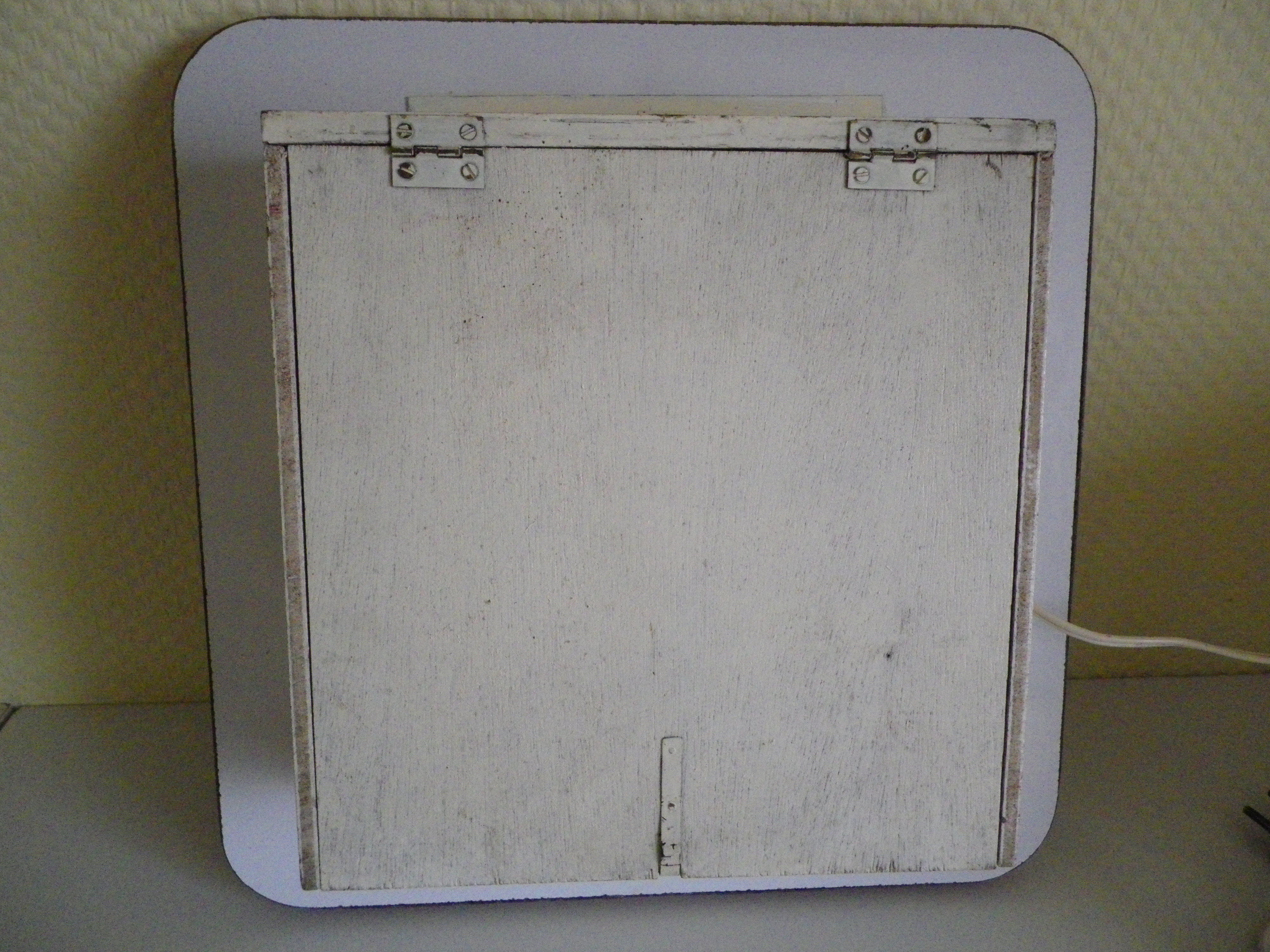 Electric wall clock in formica - 1950s