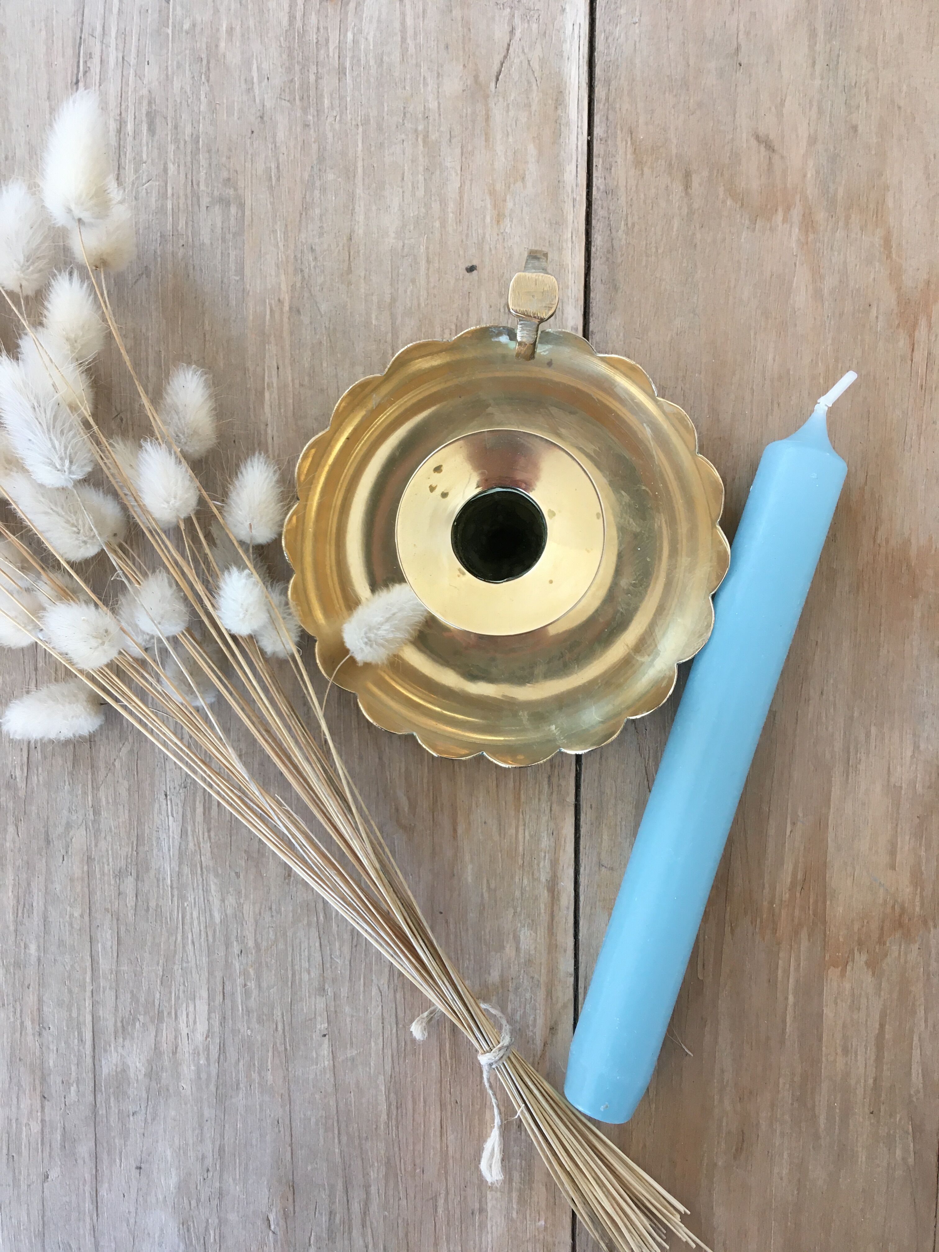 Brass cellar rat candle holder