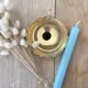 Brass cellar rat candle holder