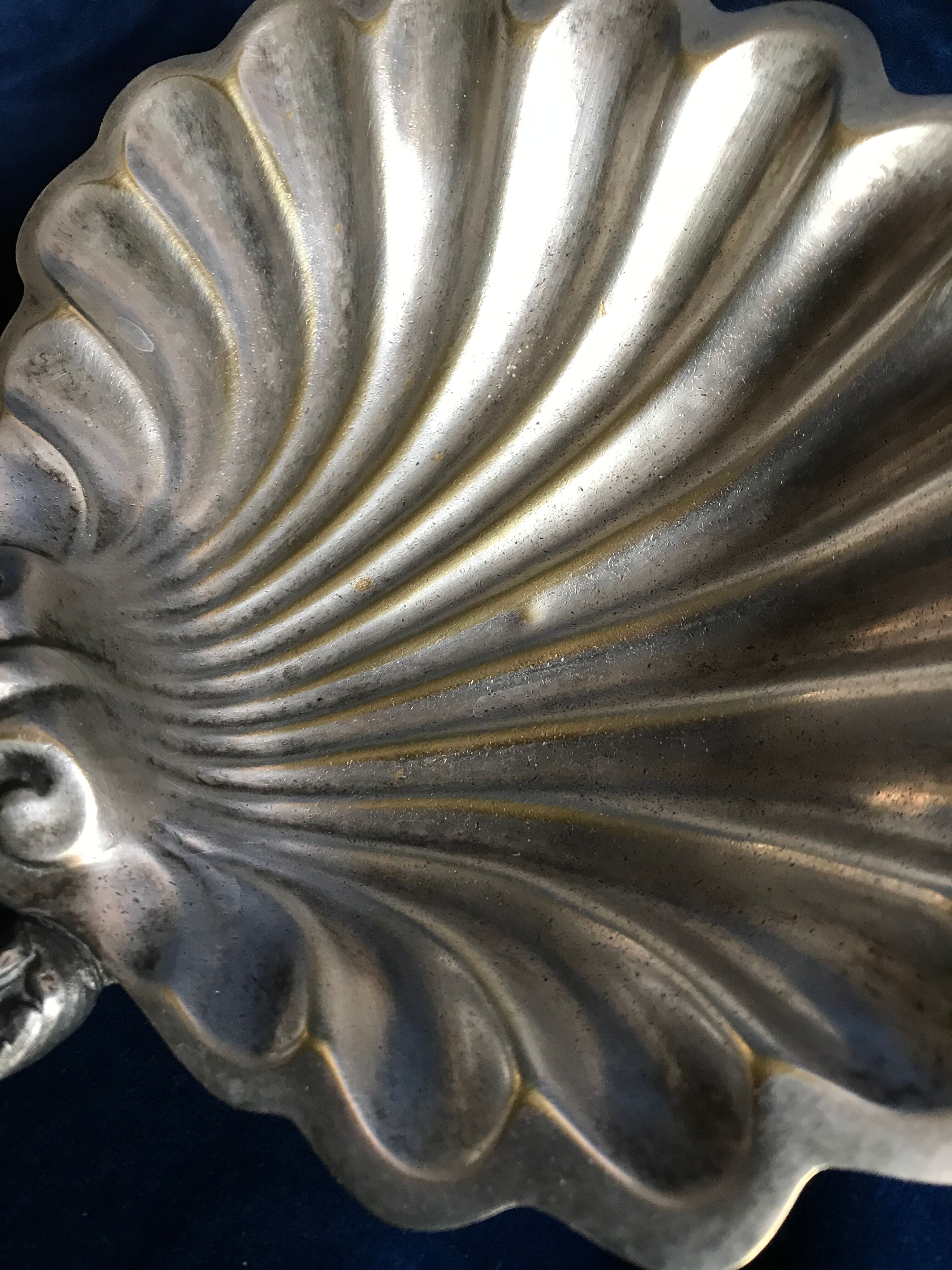 Old beggar in silver bronze