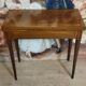 Louis XVI period game table in mahogany and marquetry.