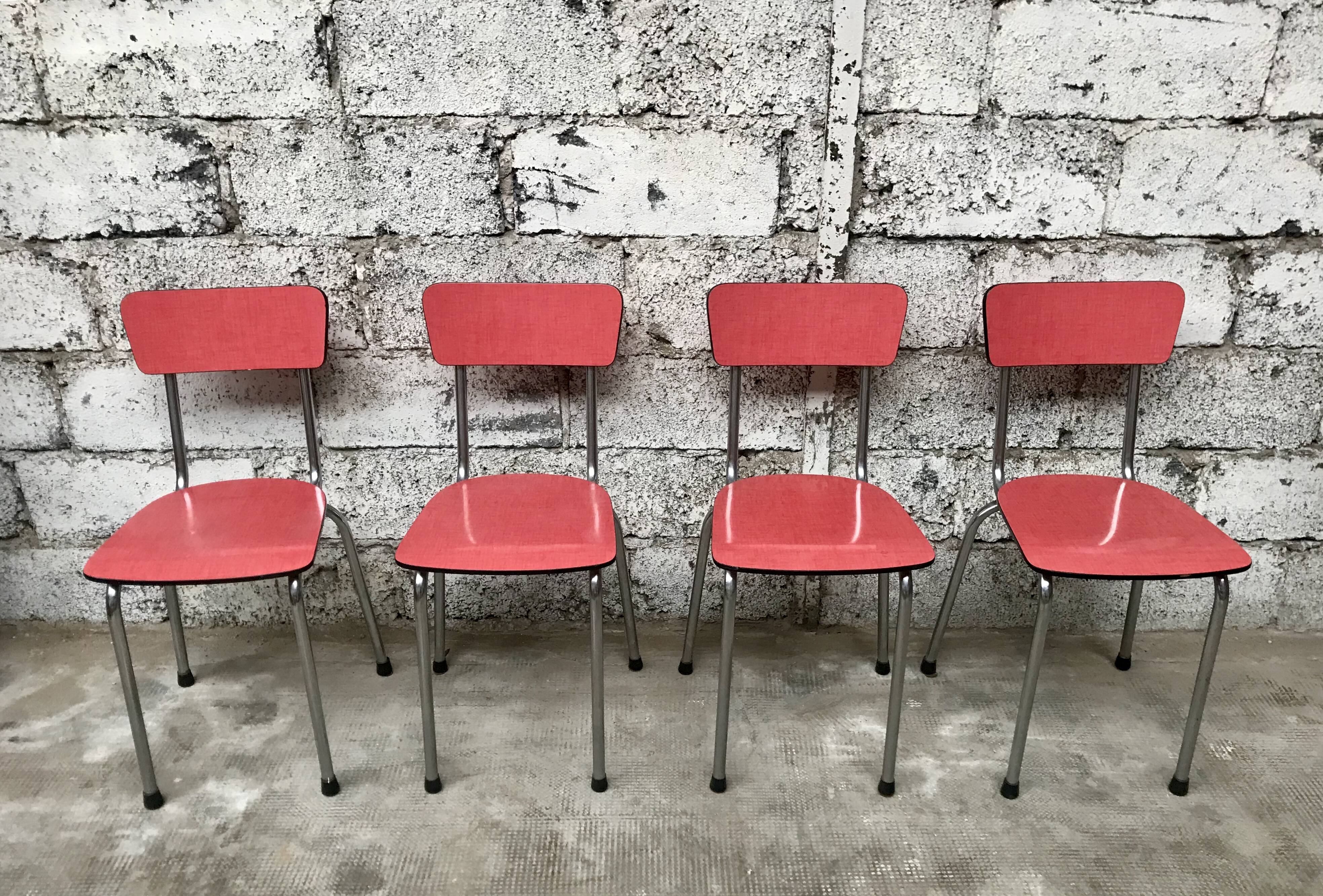 Series of 4 chairs in red formica and chrome 1950