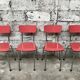 Series of 4 chairs in red formica and chrome 1950
