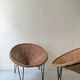 Italian sunflowers armchair in rattan and black metal, 1950s design.