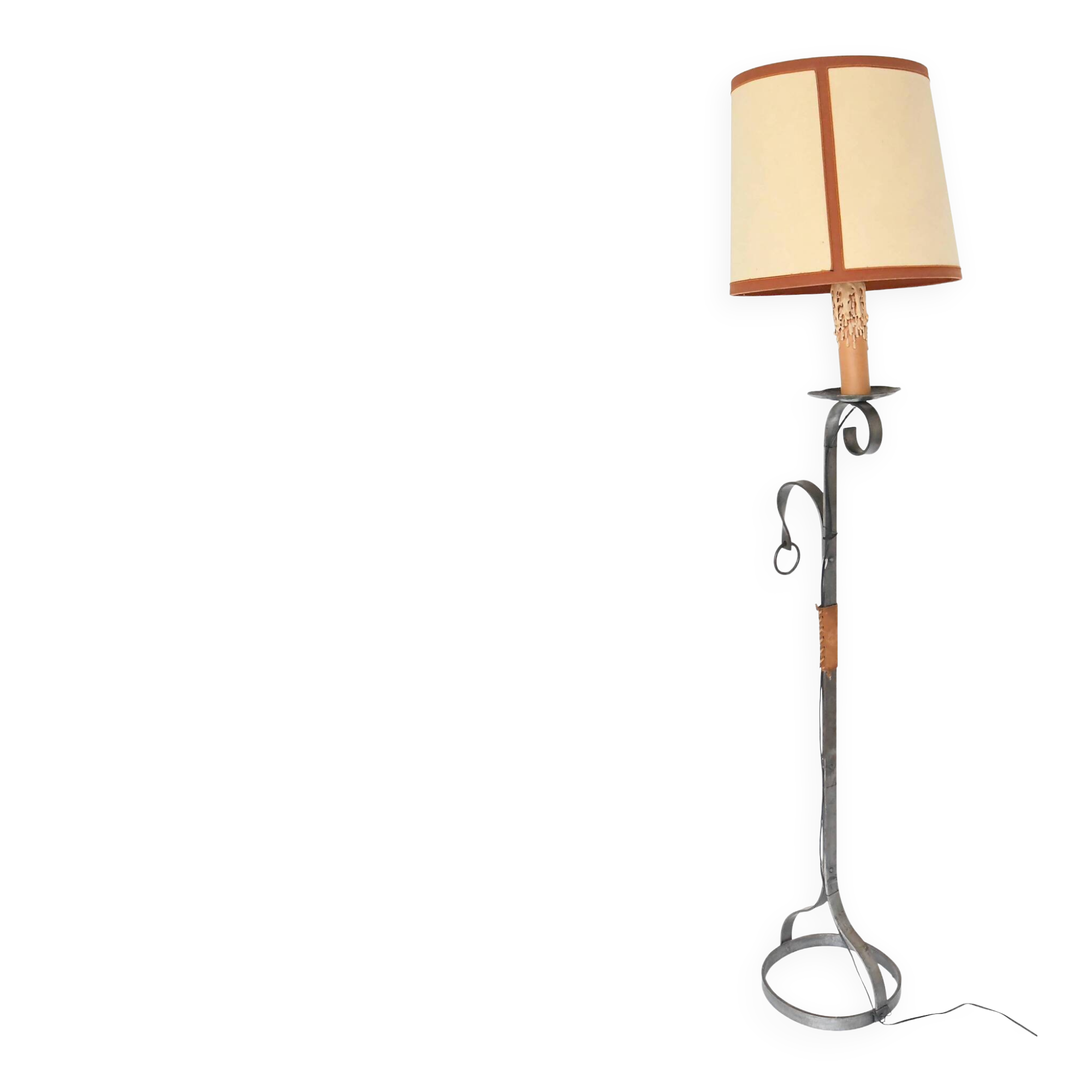 Wrought iron and leather floor lamp in the style of Jean-Pierre Ryckaert.