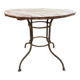 Wrought iron garden table with round top