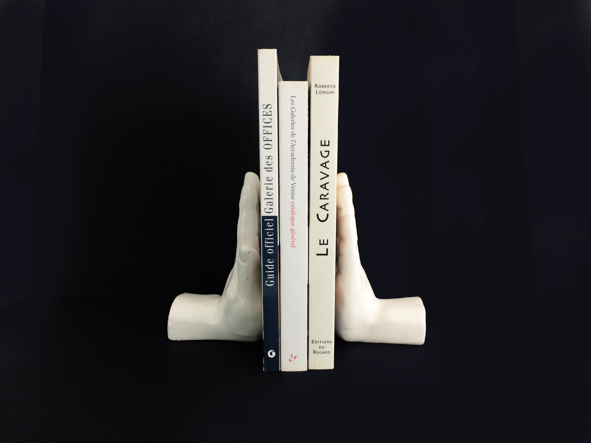 Pair of vintage handends in white ceramic to be used to comfort. Year 80