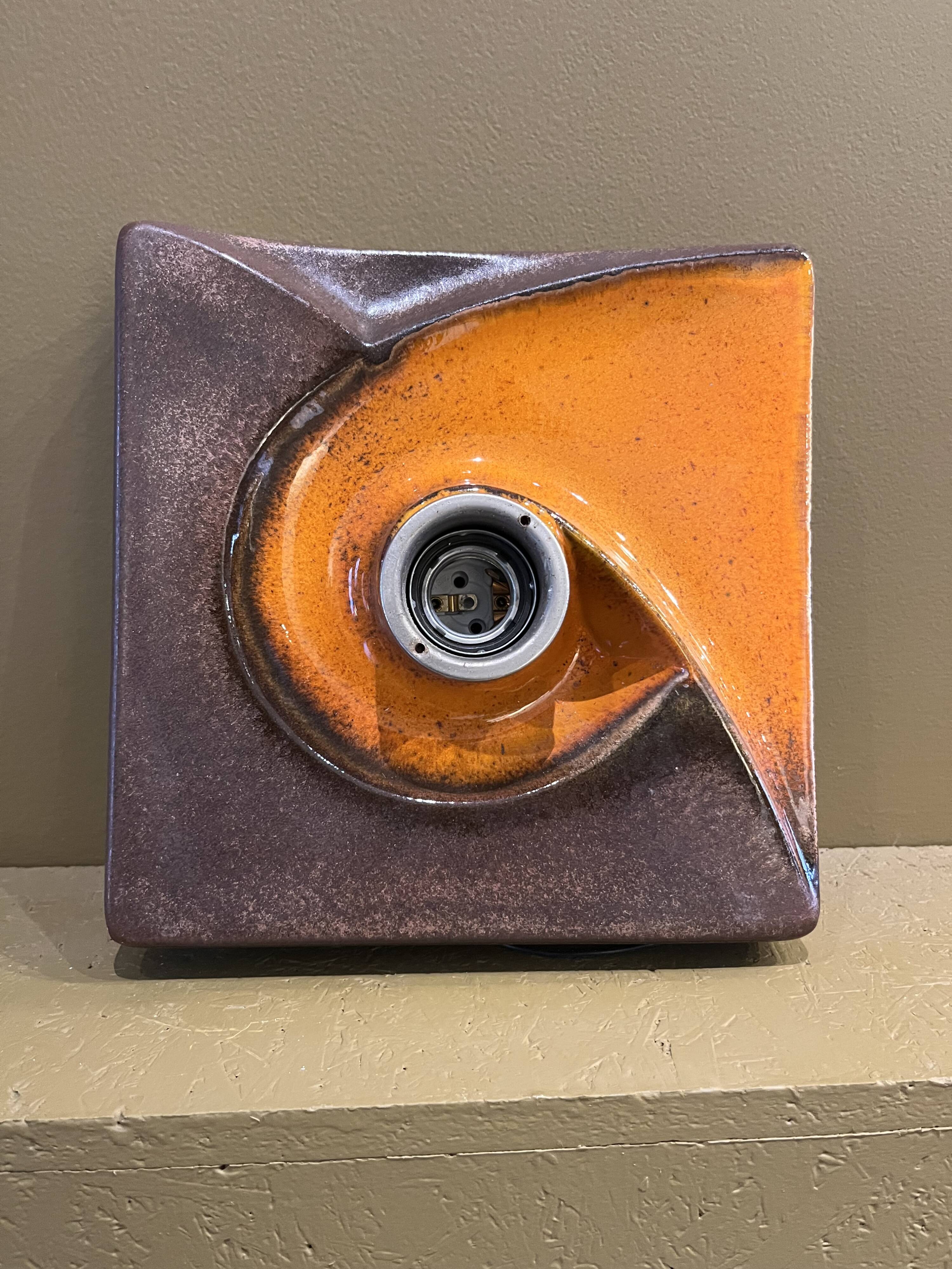 Pair of square ceramic wall sconces.