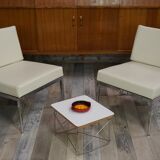 Pair of chrome and leather armchairs