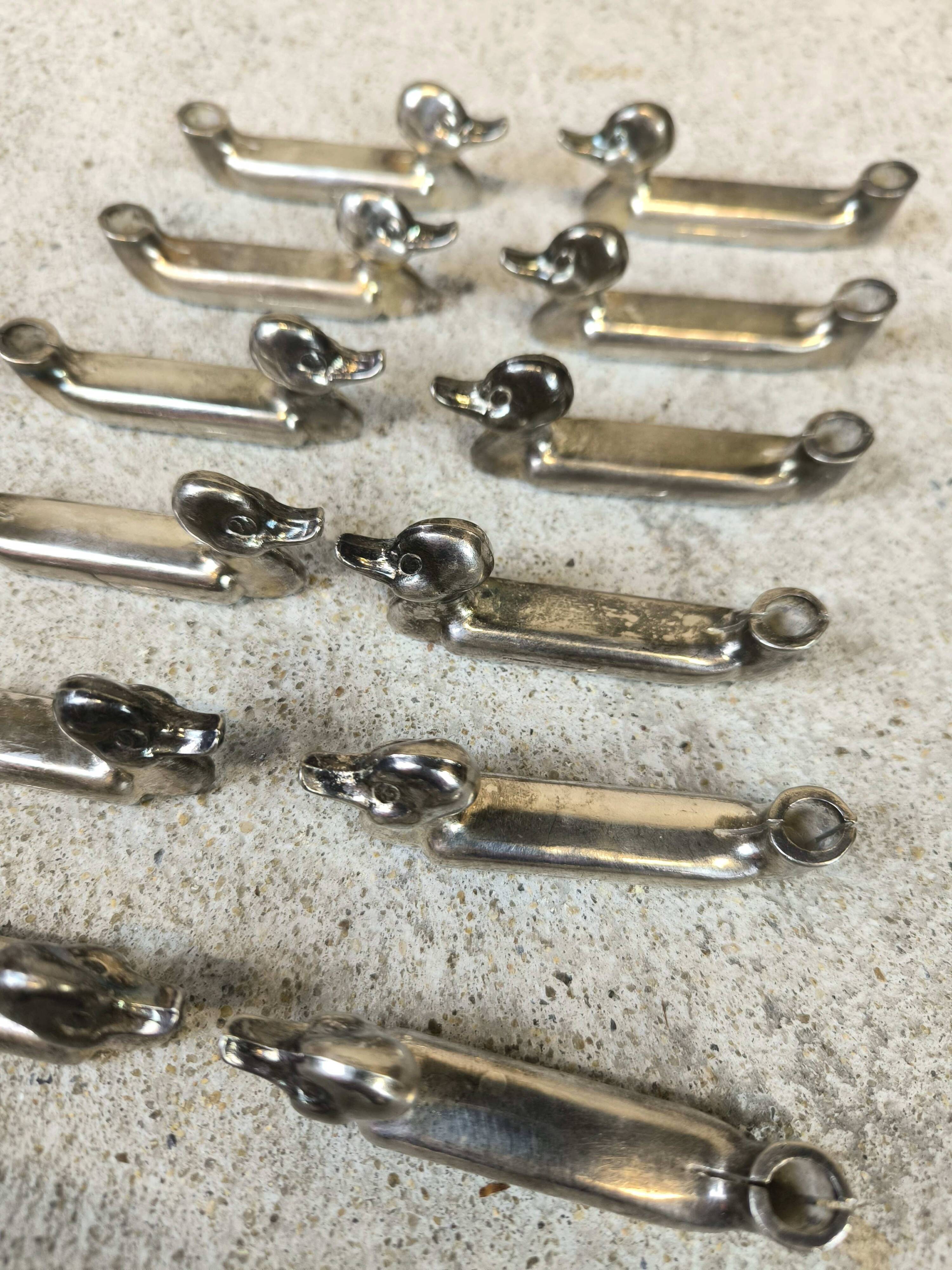 Set of 12 vintage knife rests, place card holders.