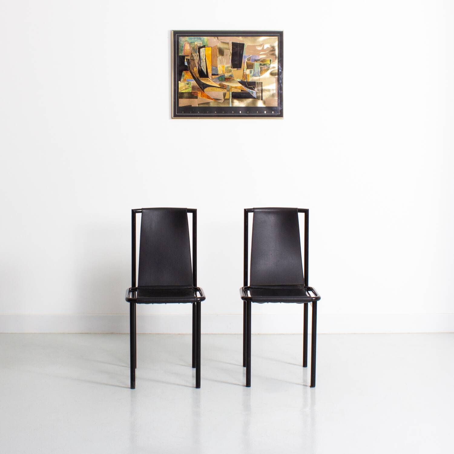 Set of 2 vintage chairs in metal and black imitation leather