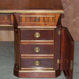 Restored antique Russian hardwood partner desk and leather armchair.