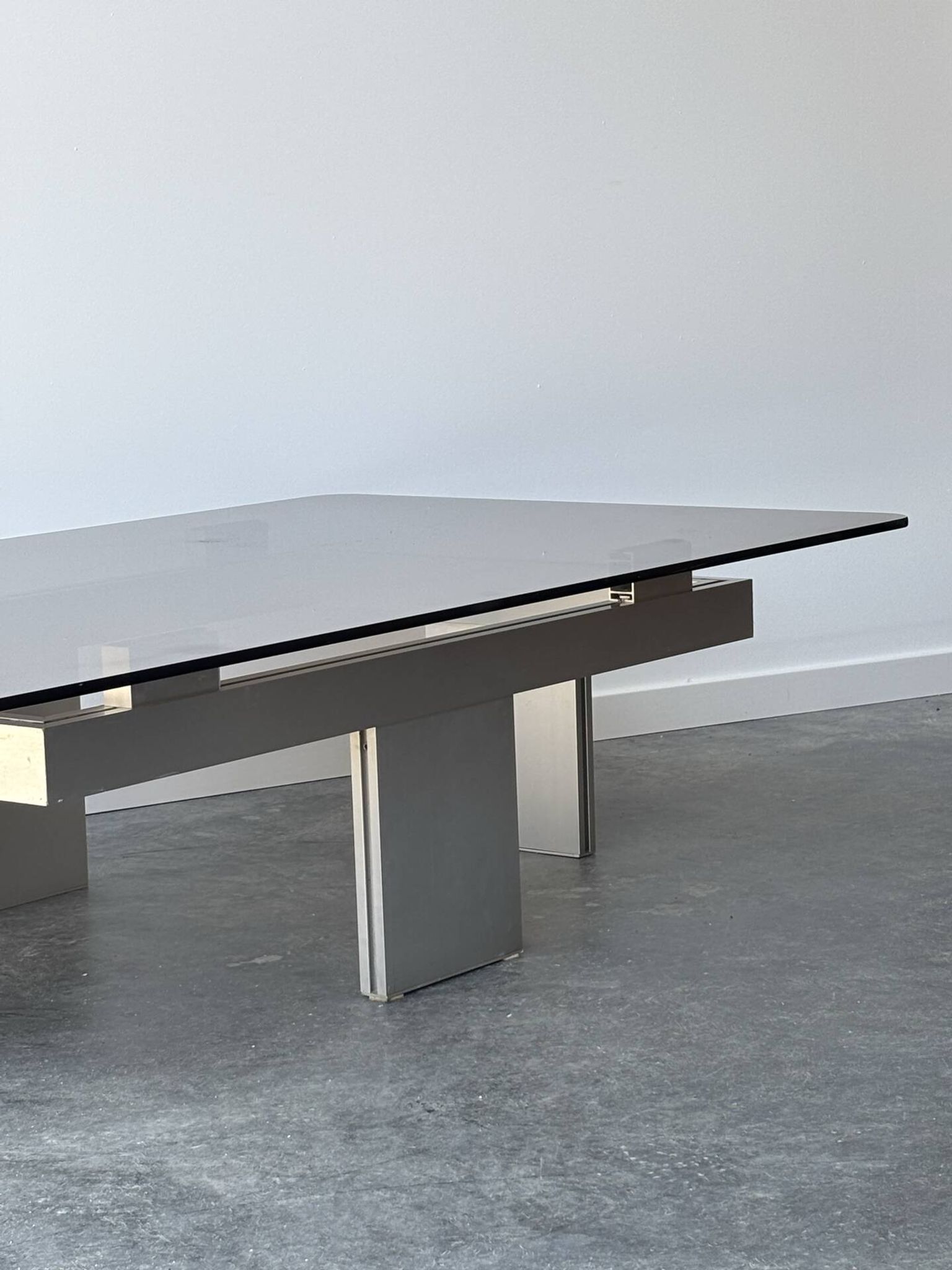 Large modernist coffee table in aluminium and smoked glass, 1970.