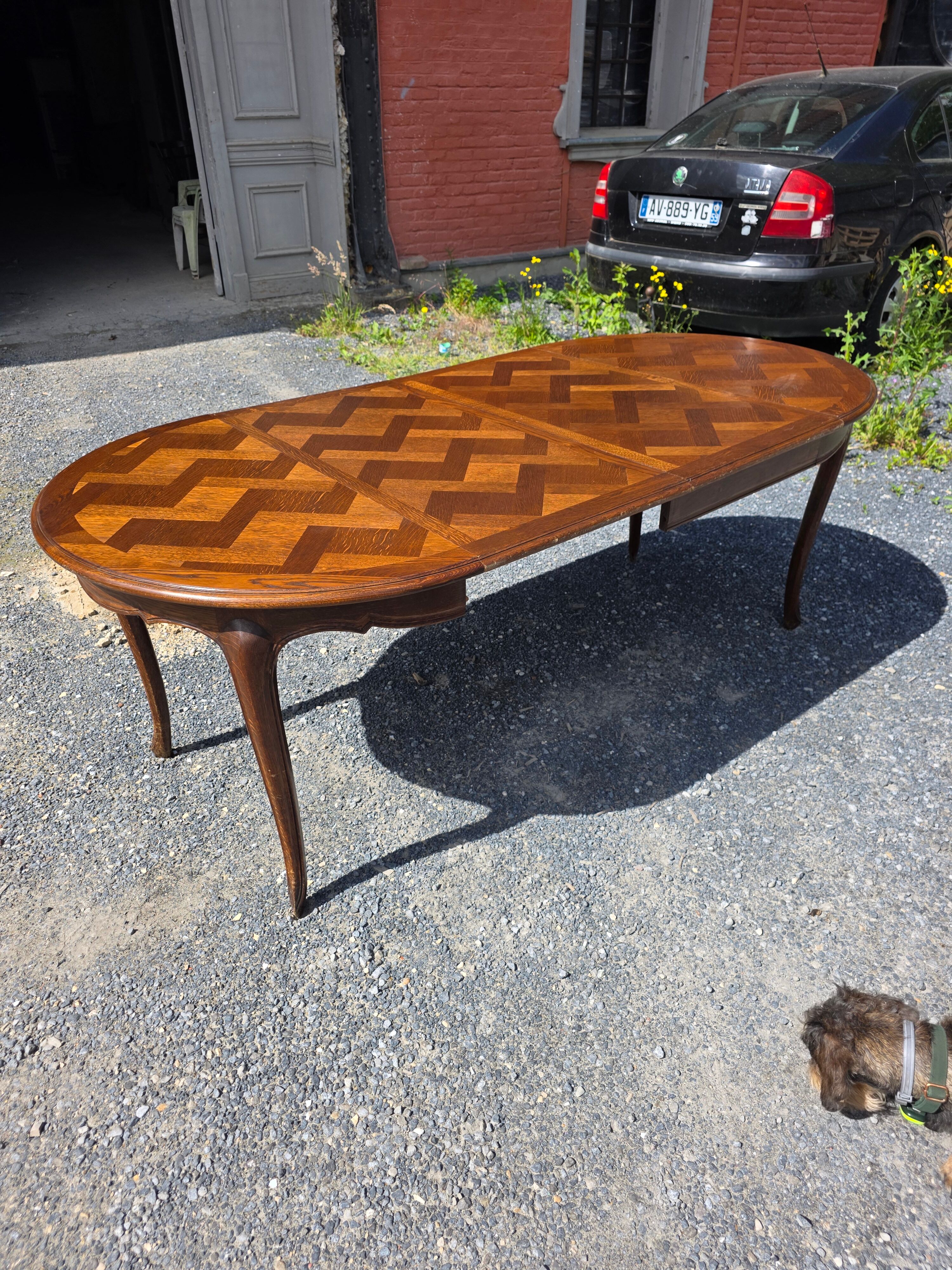 Extendable table in Louis XV style in oak (2 extensions)
