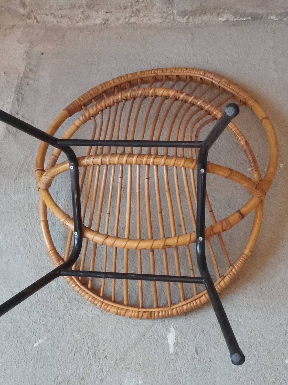 Rattan armchair with metal base from the 1950s
