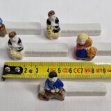 Five porcelain knife holders signed "Le Merzer", 6 cm
