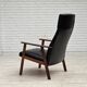 1970s, Danish armchair, black artificial leather, teak wood.