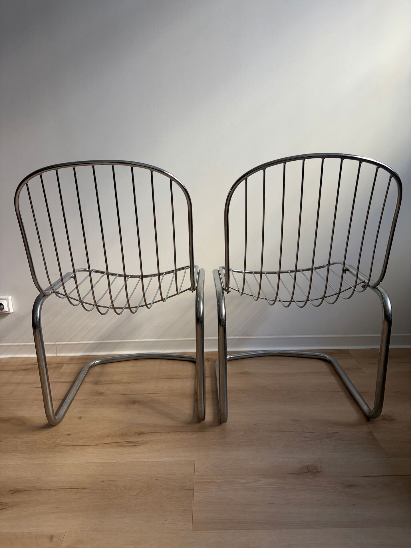 Pair of G. Rinaldi metal/chrome chairs