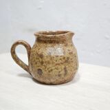 Vintage pitcher in pyrite sandstone