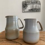Pair vintage enamelled ceramic pitchers