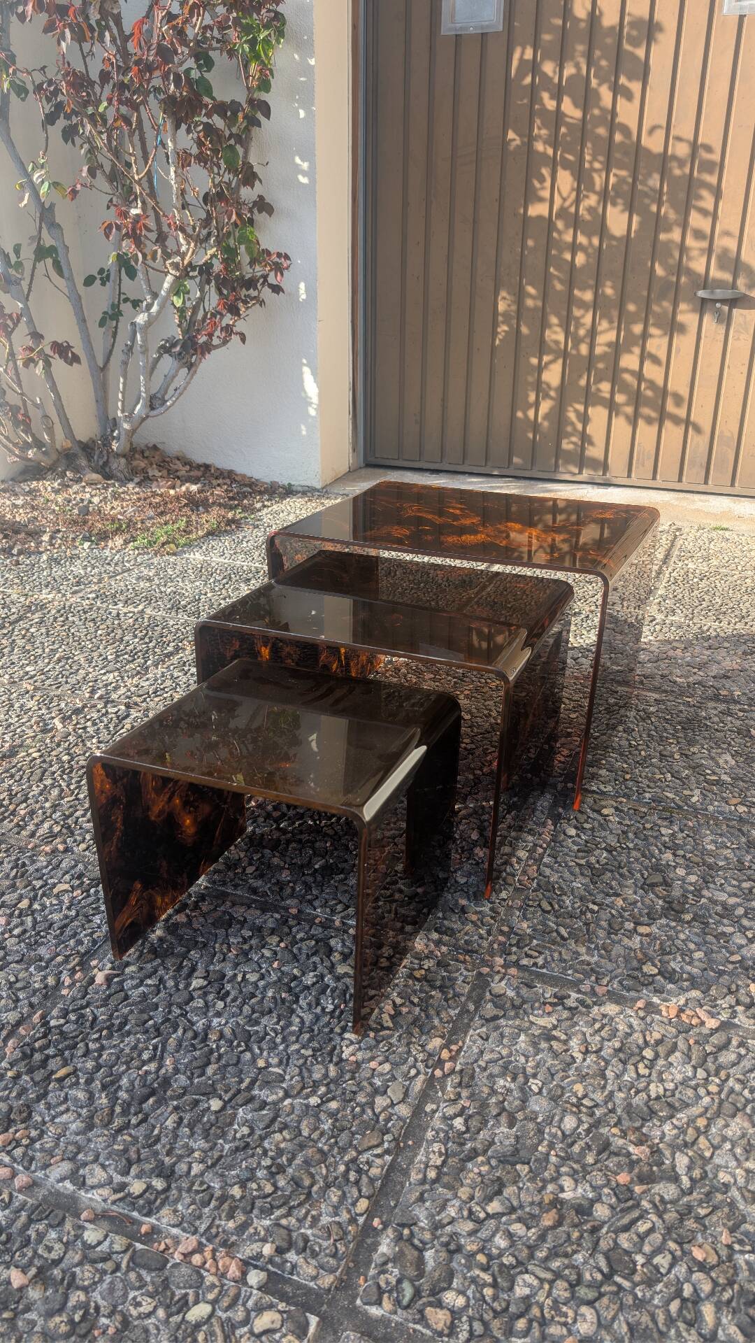 Tortoiseshell plexiglass nesting coffee tables