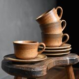 4 sandstone cups and saucers