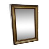 Antique mirror glass in wood and gilded stucco, late 19th century