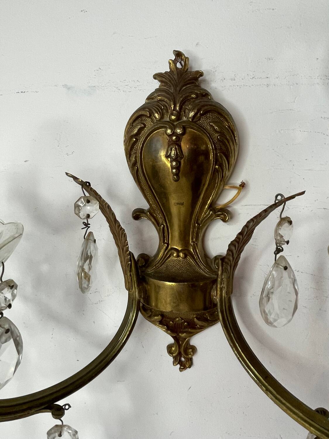 Pair of bronze and crystal wall lights