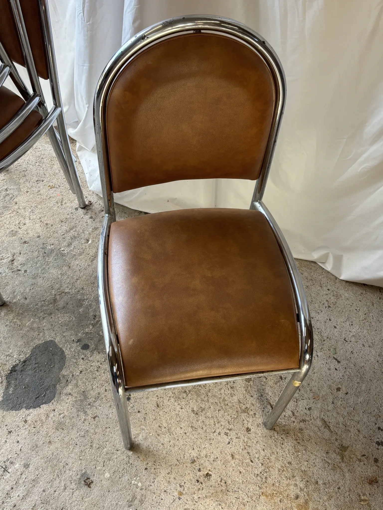 Set of 4 vintage tubular chrome chairs
