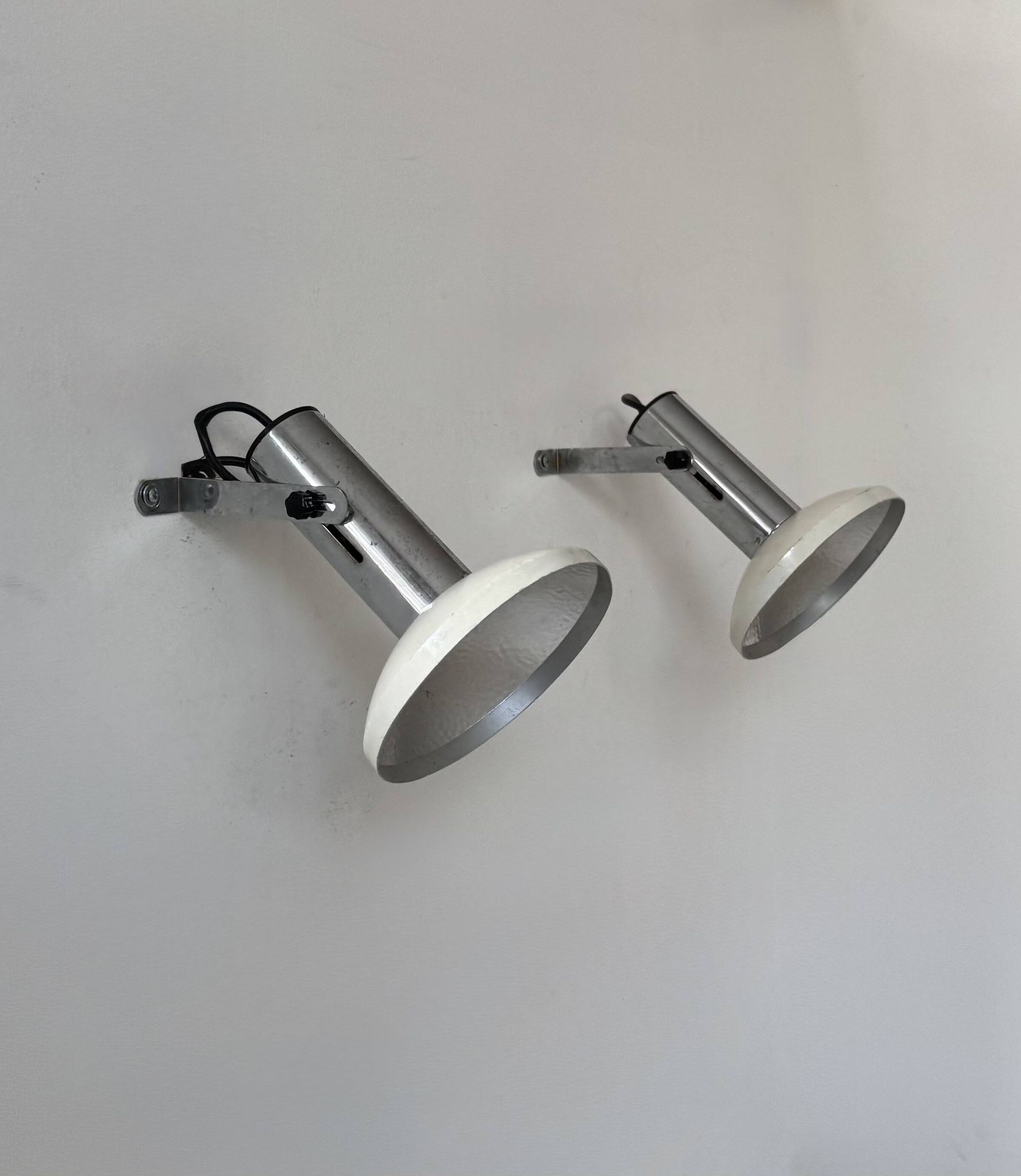 Pair of vintage adjustable wall lights, chrome and white lacquered metal, France 70