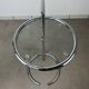 Chrome and glass design side table, adjustable.